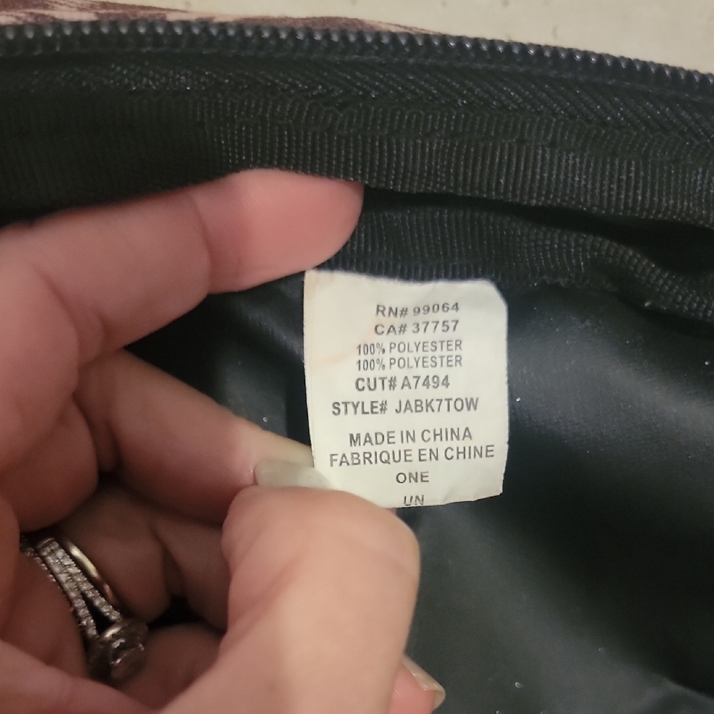 Patterned Backpack With Black Accents - image 8